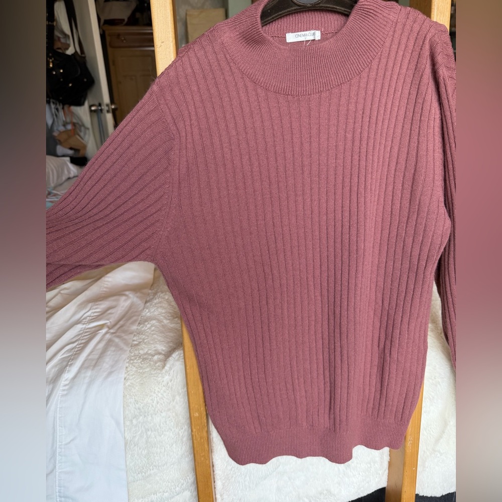 Cinema Club sweater
Fits size medium